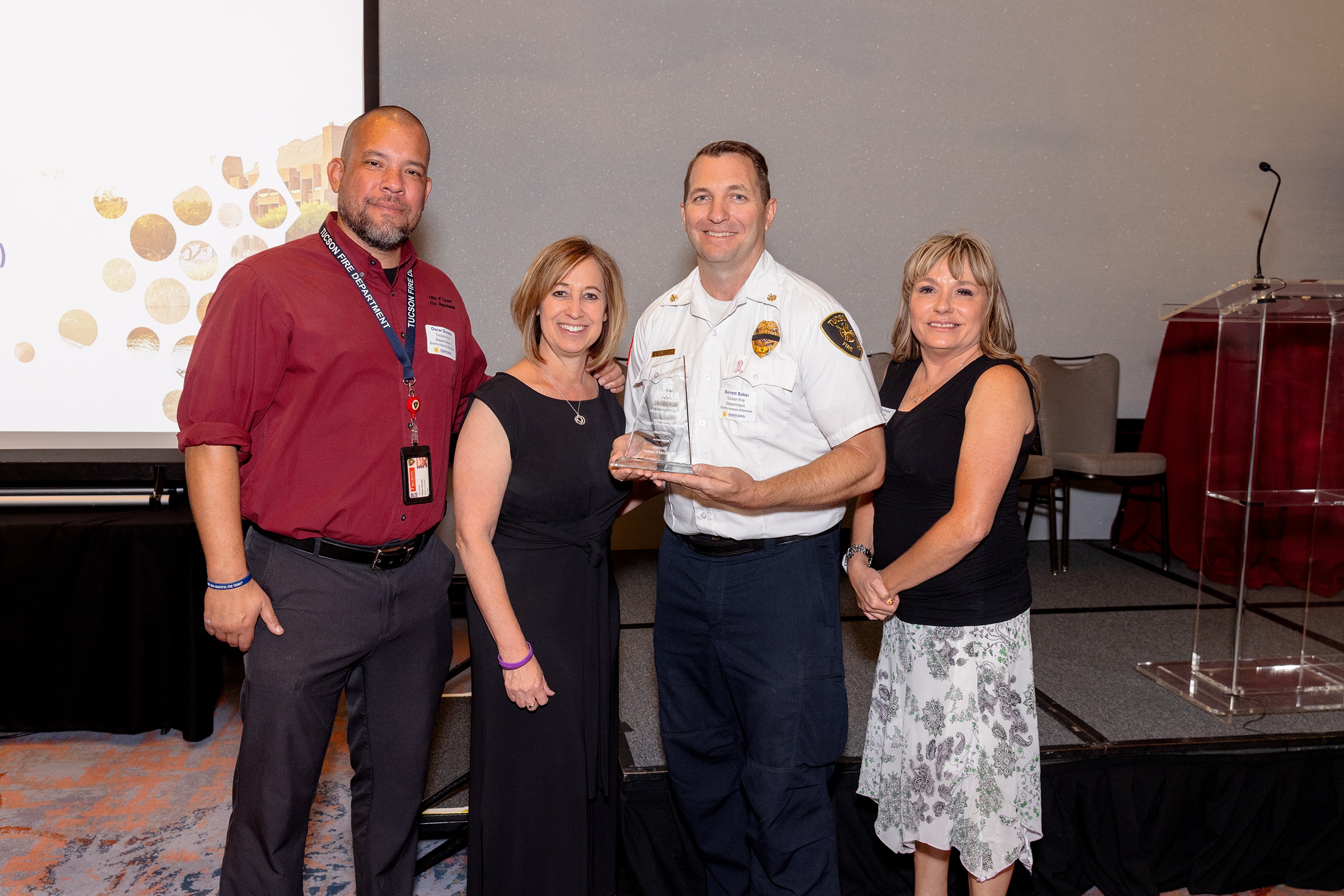 Members of the TC-3 team holding Quality Award